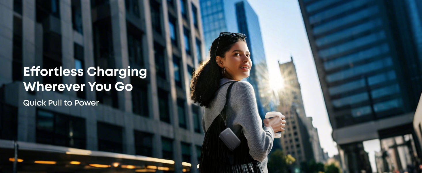 Woman holding a phone with text 'Effortless Charging Wherever You Go' in an urban setting.