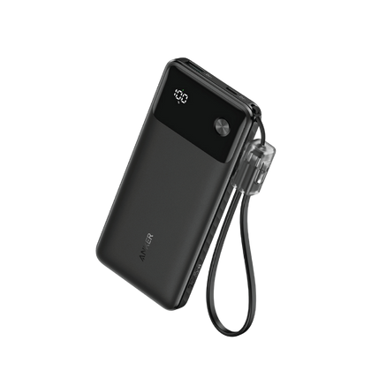 Black power bank with digital display and lanyard on a white background