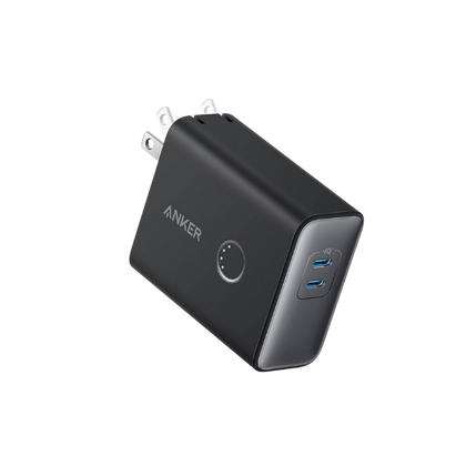 Black Anker power adapter with two USB ports on a white background