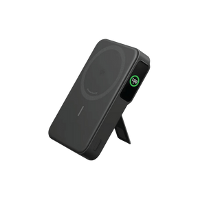 Black wireless charging stand with digital display on a white background