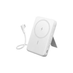 White wireless charging pad with cable on a white background