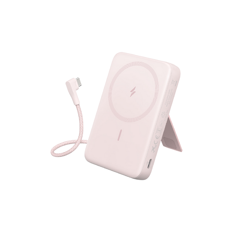 Pink wireless charging pad with cable on a white background